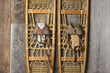 Photo: Antique Snowshoes on Rustic Cabin Wall Antique Snowshoes on Rustic Cabin Wall