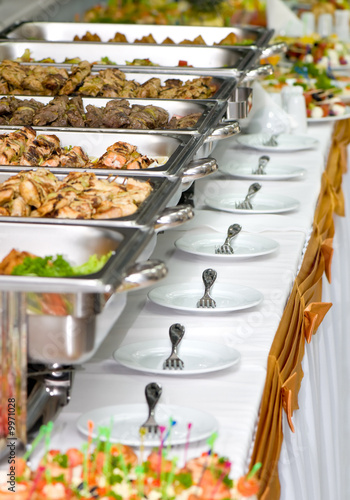 Photo: metallic banquet meal trays served on tables metallic banquet meal trays served on tables