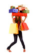 Attractive woman holding many gift boxes and bags