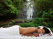 Photo: woman during outdoor spa, massage in exotic natural surrounding woman during outdoor spa, massage in exotic natural surrounding