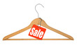 coat hanger and sale tag on white background