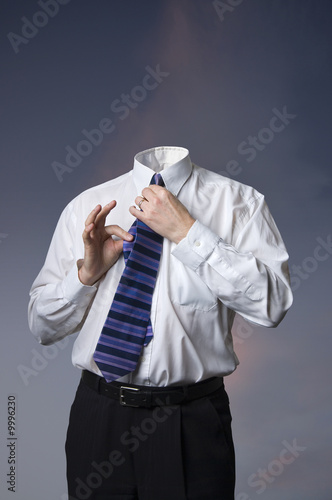 Businessman with no head for business