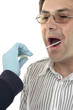 police detective or forensic scientist takes dna sample swab