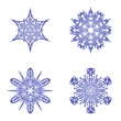 Four beautiful different snowflakes isolated on white