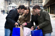 group of teenage friends doing shopping at the city center