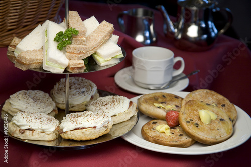 Photo: An arrangement of sandwiches and scones for afternoon tea An arrangement of sandwiches and scones for afternoon tea