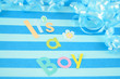 celebratory it's a boy text background with  ribbon