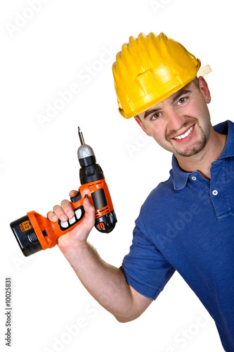 young caucasian manual worker with  drill background