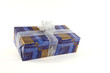 Christmas present in blue paper with silver tie