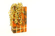 Orange christmas present with golden ties on white background