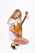 Young blonde woman on isolated background