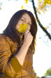 young woman with leaf