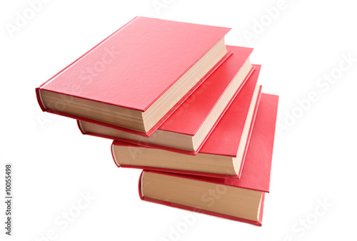 Photo: Photo of an four book on a white background Photo of an four book on a white background
