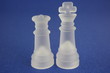 White frosted king and queen on blue background.