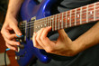 man play solo on blue guitar