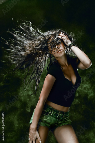 Photo: sexy young woman dancing, hair fly sexy young woman dancing, hair fly
