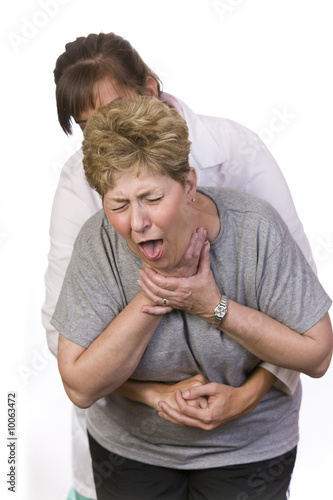 Photo: Using the Heimlich Maneuver on a choking person Using the Heimlich Maneuver on a choking person
