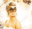 Beautiful woman in carnival mask over abstract background