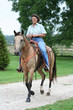 woman riding a horse