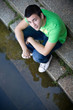 portrait of a relaxing boy on the stairs portrait of a relaxing boy on the stairs