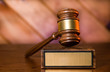 Wooden justice gavel and block with brass Wooden justice gavel and block with brass