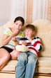 Girls and the boy on sofa