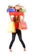 Pretty shopping girl hold many gift boxes and bags