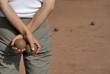 Lady playing jeu de boules in France