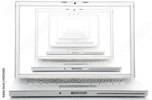Silver laptop isolated in studio. Silver laptop isolated in studio.