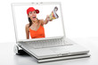 A girl holding a newspaper in her hand on a laptop screen.