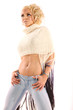Pretty blonde woman in jeans dancing