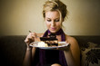 Photo: beautiful girl in a coffee shop eating beautiful girl in a coffee shop eating