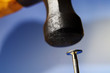 Photo: closeup of a hammer hitting a nail closeup of a hammer hitting a nail