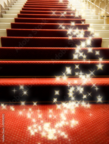 Stairs covered with red carpet