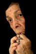 Old Women Deep in Prayer wearing a black Veil