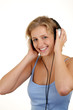 Pretty girl listening to the music.