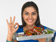 asian female chef with her roasted chicken