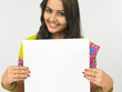 beautiful young woman with a blank placard