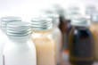 Bottles with shampoo, conditioner, and body lotion