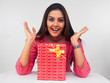 an attractive young woman with a gift box