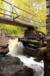 Wooden mill over a river in autumn, Finland