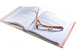 Spectacles on book