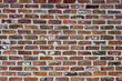 Roough red bricks and motar with the mortar outlinging the brick Roough red bricks and motar with the mortar outlinging the brick
