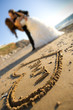 happy wedding couple is kissing on the seaside