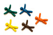 Multicolored clay people flying over the white background