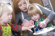 young family cooking in the kitchin