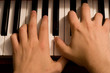 Two hands on the piano keys