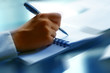 businessman hand write message in note businessman hand write message in note