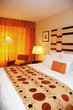 Photo: Spacious and nicely deocrated room. Orange Theme with King Bed Spacious and nicely deocrated room. Orange Theme with King Bed