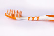Orange tooth brush